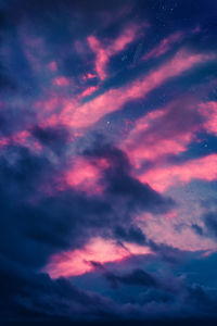 Low angle view of dramatic sky during sunset