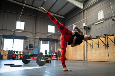 Low section of man standing on gym