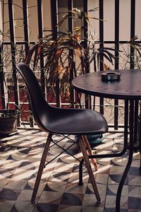 Empty chairs and table in restaurant