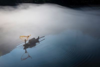 Silhouette of fisherman