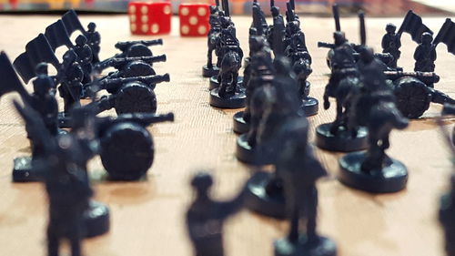 Close-up of war figurines on table