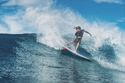 Man splashing water in sea