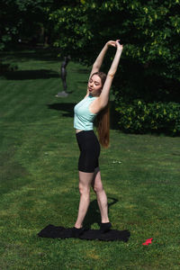 Woman exercising in park