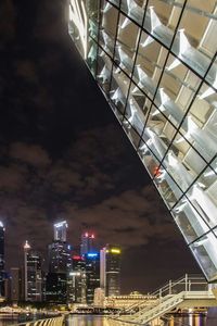 Low angle view of illuminated building at night