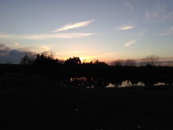 Scenic view of landscape at sunset