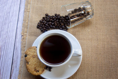 High angle view of coffee cup on table