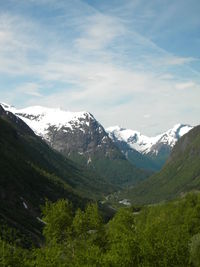 Scenic view of snow covered mountains