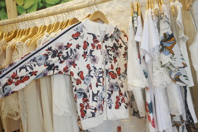 Close-up of clothes hanging for sale in store