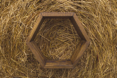 High angle view of hay on field