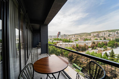 Buildings against sky seen from balcony