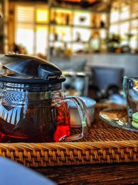 Close-up of glass jar on table at restaurant