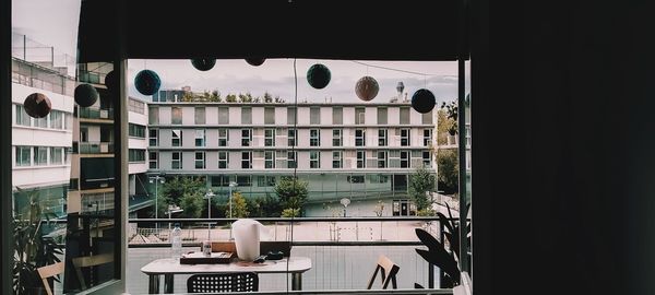 Reflection of buildings on glass window