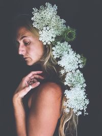 Beautiful young woman looking away