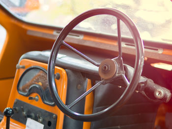 Close-up of vintage car steering wheel