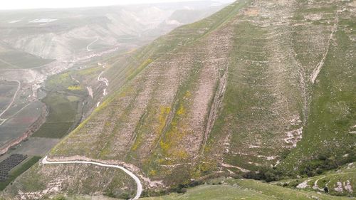 Landscape with mountain range in background