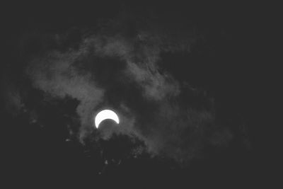 Low angle view of moon against sky at night