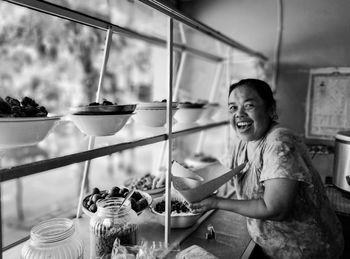 Portrait of smiling man having food