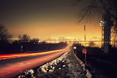 Light trails on road at night