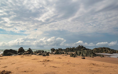 Scenic view of beach against sky