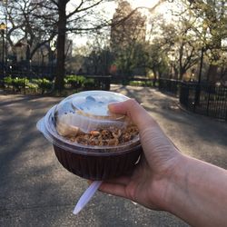 Cropped hand holding ice cream