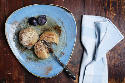 High angle view of bread in plate on table