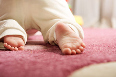 Low section of baby feet