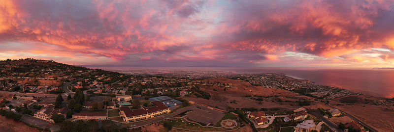 High angle view of townscape against sky at sunset