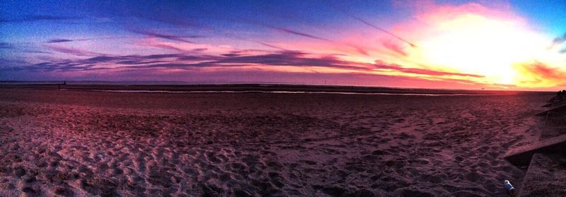 Scenic view of landscape at sunset