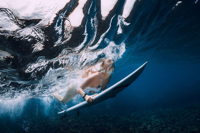 Man swimming in sea