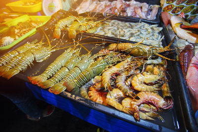 High angle view of lobsters in market