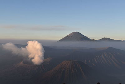 Panoramic view of volcanic landscape against sky