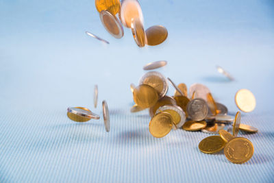 High angle view of coins on table