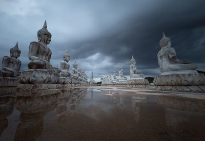 Statue of historic building against sky