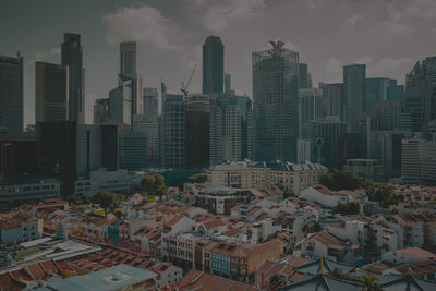 High angle view of buildings in city against sky