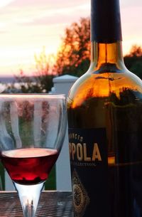 Close-up of beer glass bottle on table