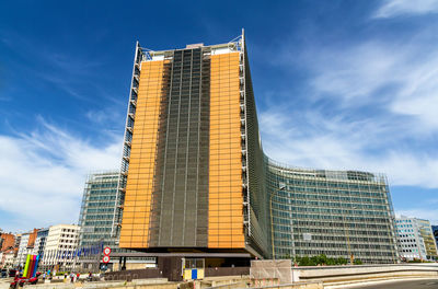 Low angle view of modern buildings against sky