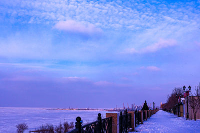 Scenic view of sea against sky during winter