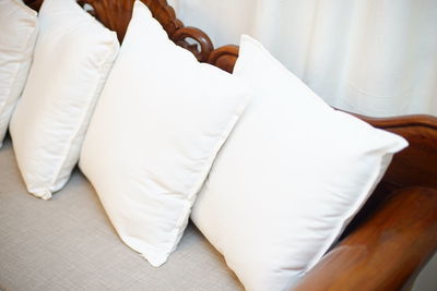 High angle view of woman resting on bed at home