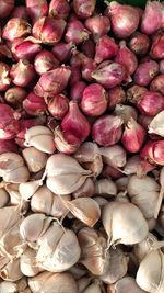 Full frame shot of onions for sale at market stall