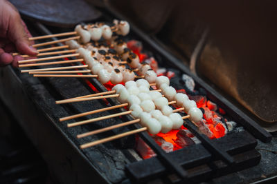 Cropped image of man preparing food