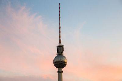 Low angle view of fernsehturm tower against sky