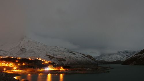 Scenic view of illuminated city against sky at night