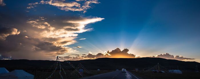 Road against sky during sunset