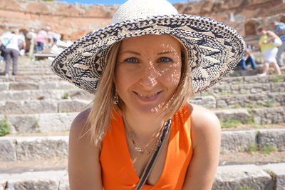 Portrait of smiling young woman outdoors