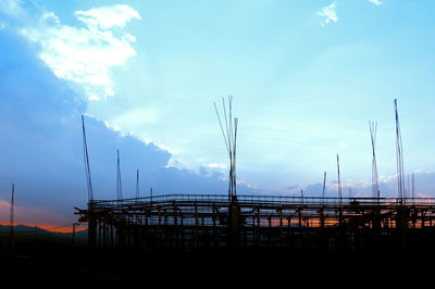 Silhouette of bridge against sky