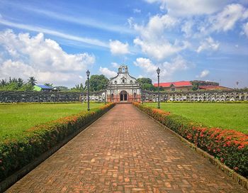 View of historical building against cloudy sky