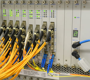 Network switch with fiber optic network cables in a data center