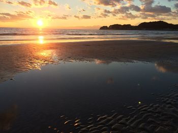 Scenic view of sunset over sea