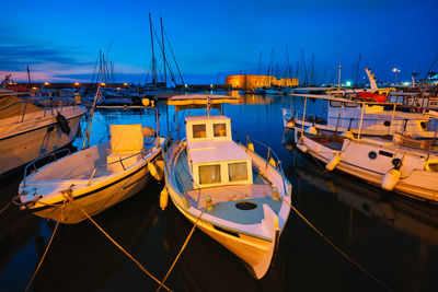 Venetian fort in heraklion and moored fishing boats, crete island, greece