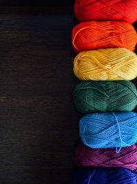 Colorful ball of wools arranged on table